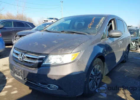 2014 Honda Odyssey Touring/Touring Elite z USA, uszkodzony, nr VIN 5FNRL5H9XEB003947